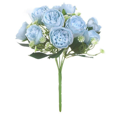 Cette image montre un bouquet de pivoines artificielles de couleur bleu