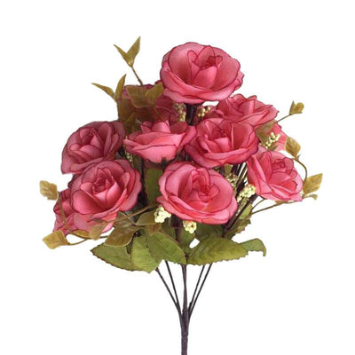 Cette image montre un bouquet de roses artificielles de couleur rose