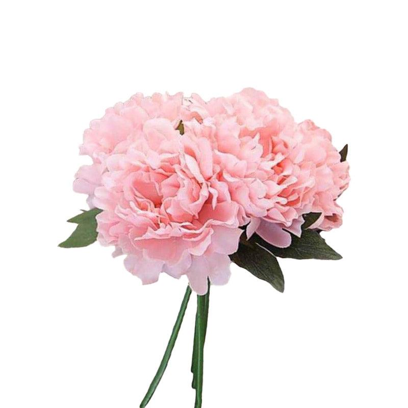 cette image montre un bouquet de pivoines artificielles de couleur rose