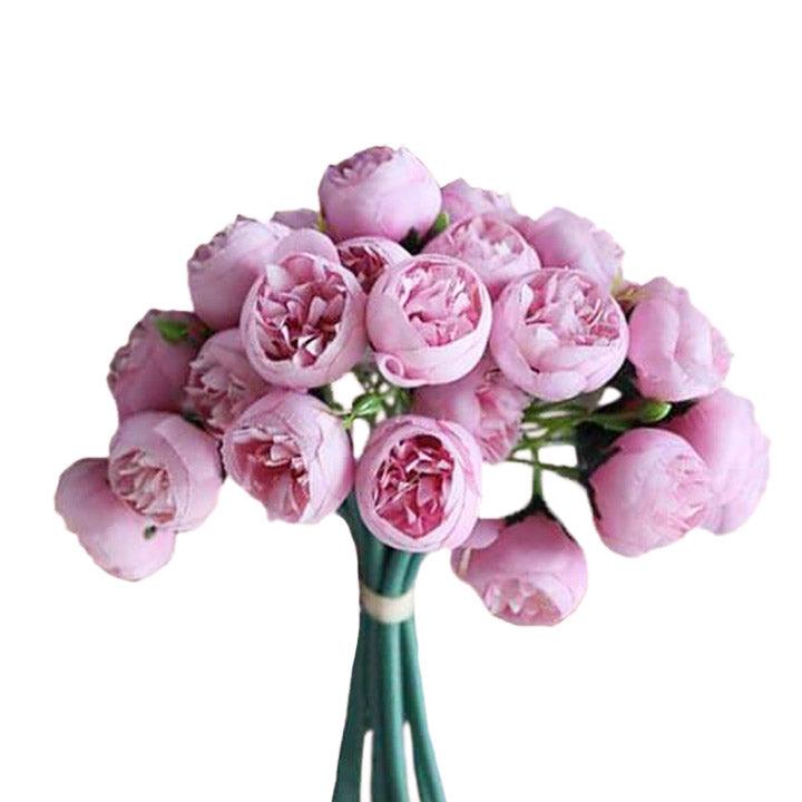 Cette image montre un bouquet de pivoines artificielles de couleur rose