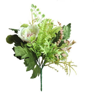 Cette image montre un bouquet de plantes vertes artificielles. Cette fausse plante est de couleur blanche