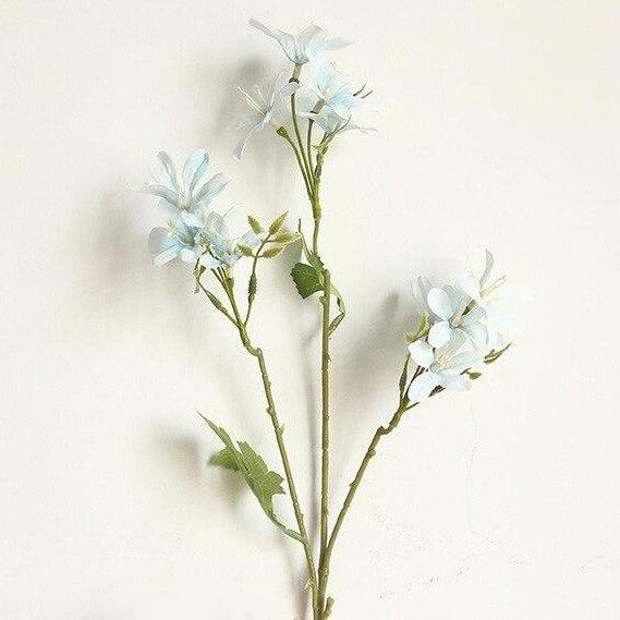 Cette image montre une tige d'orchidée artificielle de couleur bleu