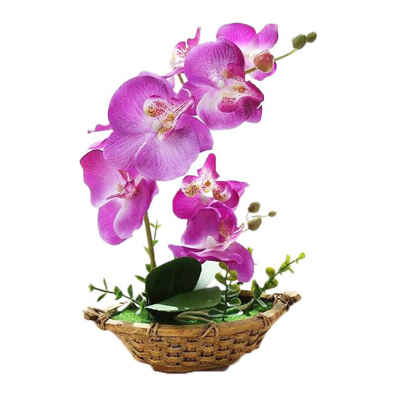 Cette image montre une orchidée artificielle violet dans un pot.