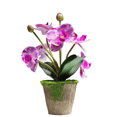 Cette image montre une orchidée artificielle de couleur rose et violette dans un pot
