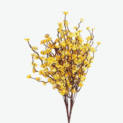Cette image montre une fausse fleur. Cette fleur artificielle jaune est une imitation d'un prunier